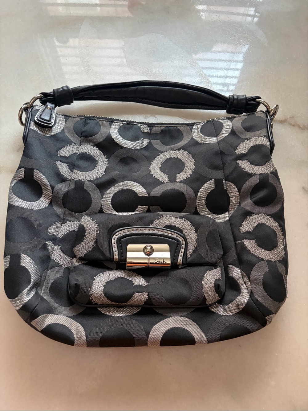Coach Black Shoulder Bag with Silver Circle Print